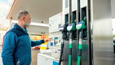 Customer paying for fuel at a gas station in Belgium