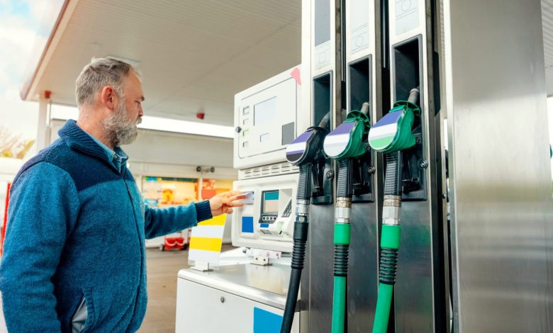 Customer paying for fuel at a gas station in Belgium