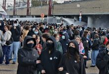 Belgian police use a water cannon to disperse protesters near Brussels-South railway station.