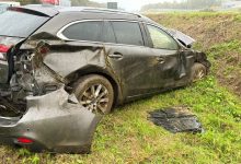 Car in the central reservation of the A19 motorway in Zonnebeke after an accident during heavy rain