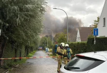 Firefighters respond to a major warehouse fire in the ’t Hoge area of Kortrijk, Belgium.