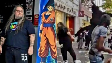 Pierre Collin standing outside the damaged Micromania video game store in Nice after looters attacked the business.